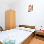 Xi *